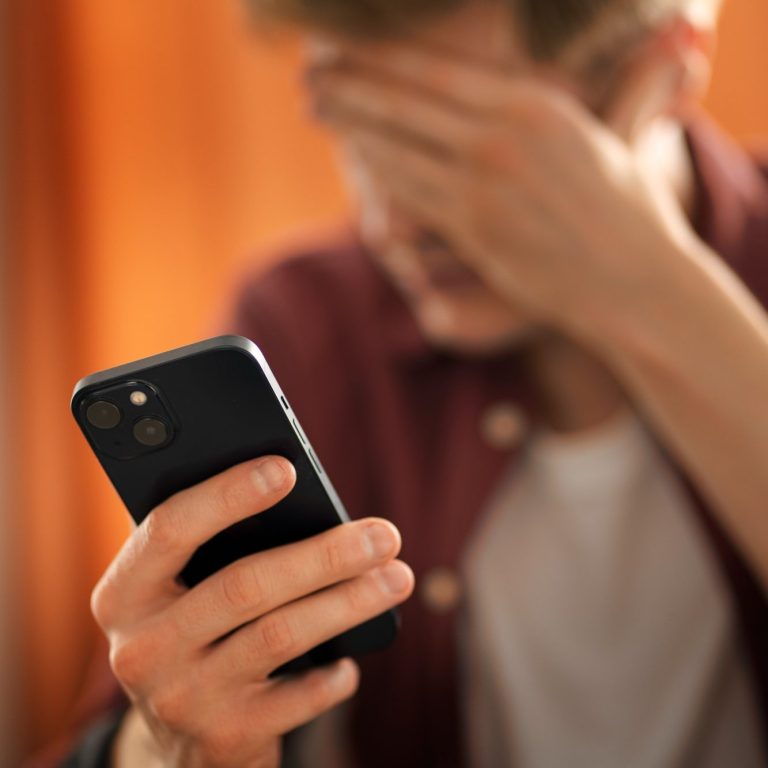 Person obsessed with his smart phone, unable to stop scrolling